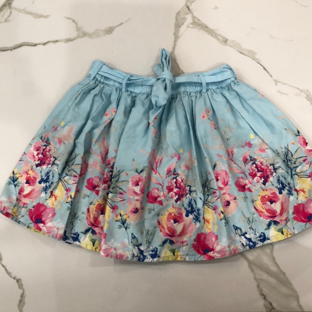 Cute light blue skirt with floral print